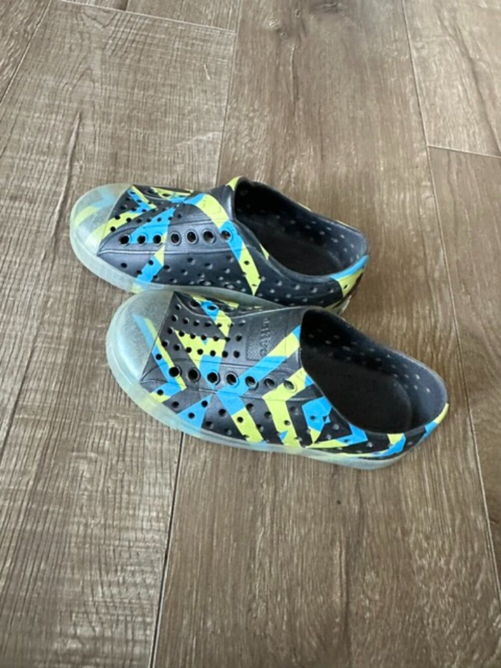 Native glow in the dark shoes size 9